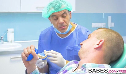 Big ass blonde harlot and horny dentist have a fuck session in the middle of a operation