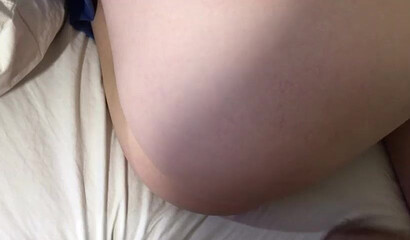 Big ass teen is forced to receive a large wand up her cunt before her feet is covered in cum