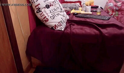 Slutty amateur teen is proud to put her ass on display on her bedside wearing tight jeans