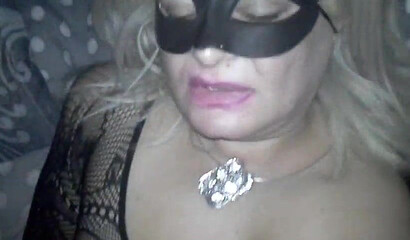 Masked domino with fat ass sucks a lucky guy's tattooed dick and lets him penetrate her cunt