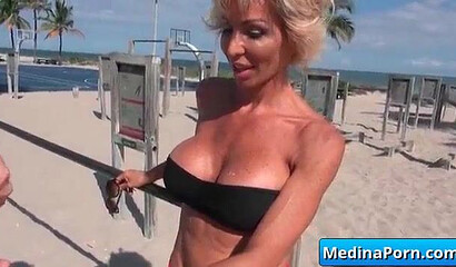 Blonde MILF with fat ass is desperate to seduce much younger guy and make him fuck her