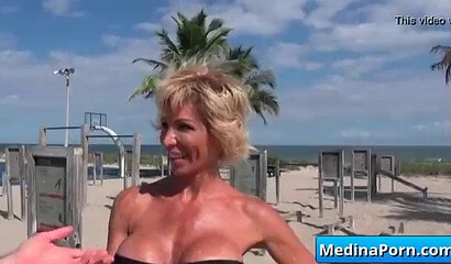 Blonde MILF with fat ass is desperate to seduce much younger guy and make him fuck her