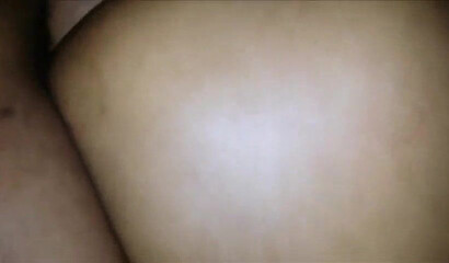 Black babe with an enormous ass takes a hard pounding from the back while squirming gently