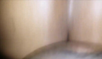 Black babe with an enormous ass takes a hard pounding from the back while squirming gently