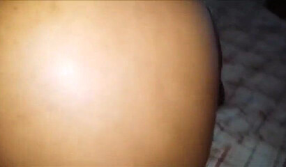 Black babe with an enormous ass takes a hard pounding from the back while squirming gently