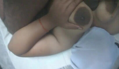 Adorable aunty lays down and massages her big fat ass while making sure that she moans