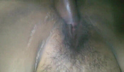 Adorable aunty lays down and massages her big fat ass while making sure that she moans