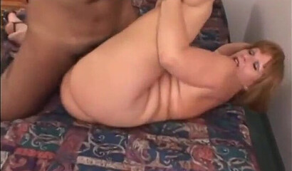 MILF with two huge cheeks pops her booty for a hung white dude and moans while doing so