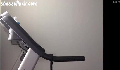 Curvy ebony is all naked a shows her phat bottom and huge tits while running on a treadmill