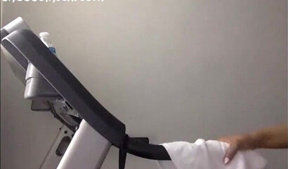 Curvy ebony is all naked a shows her phat bottom and huge tits while running on a treadmill