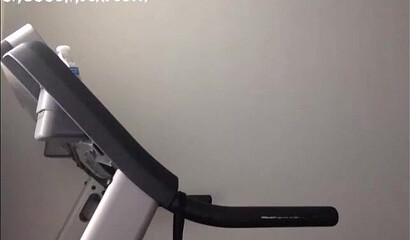 Curvy ebony is all naked a shows her phat bottom and huge tits while running on a treadmill