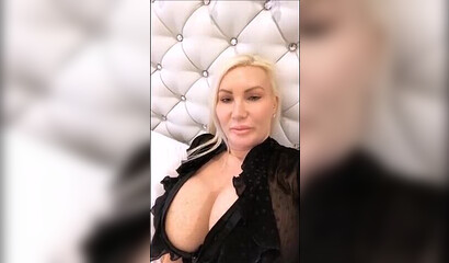 Hot mum wearing her finest lingerie plays with big tits and shows her huge ass on live cam