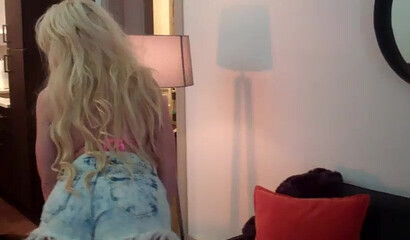 Horny big ass cougar plays with her large melons as she strips down and rubs her pussy