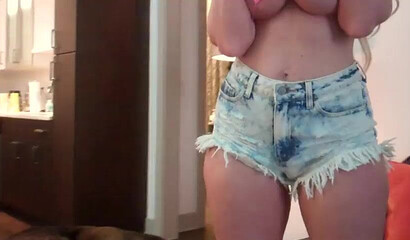 Horny big ass cougar plays with her large melons as she strips down and rubs her pussy