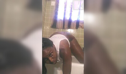 Phat bottom ebony strips down in her bath tub and shows us her wet pussy and tight asshole
