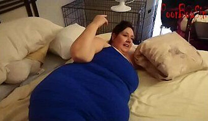 Granny with huge titties lays down on the bed and shows off her huge ass to a young man