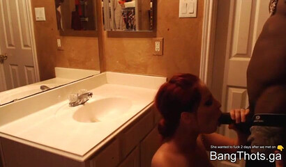 Tight ass redhead tattooed slut gets down and dirty with a chocolate man in the bathroom