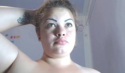 Busty babe with big tits shows off on webcam