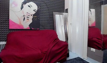 Curly haired babe loves her new black dildo