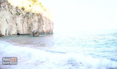 Public beach sex ends with a warm creampie