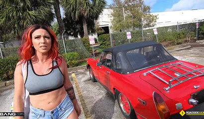 Inked-up redhead blows and rides a mechanic's cock