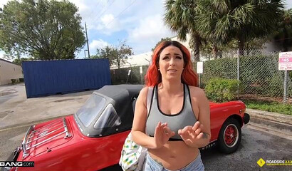 Inked-up redhead blows and rides a mechanic's cock