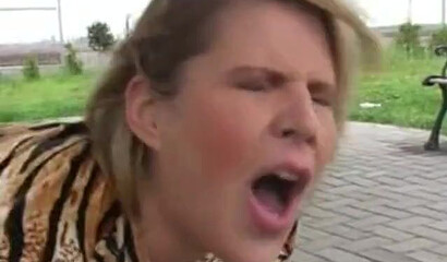 MILF with huge tits rubs her pussy and gets fucked outside