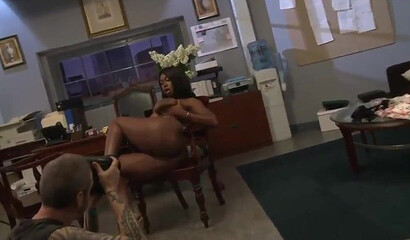 ebony MILF with big tits rides white knob