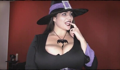 Sexy witch spreads legs and inserts big dildo in her cunt