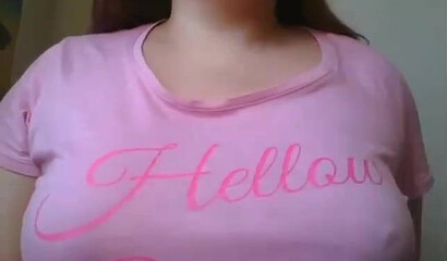 Slutty girl with big tits shows her shaved muff on the webcam