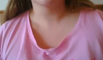 Slutty girl with big tits shows her shaved muff on the webcam