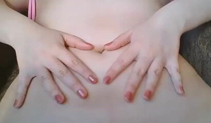 Slutty girl with big tits shows her shaved muff on the webcam