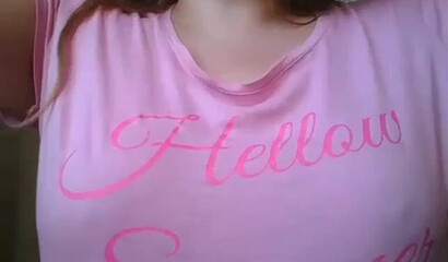 Slutty girl with big tits shows her shaved muff on the webcam