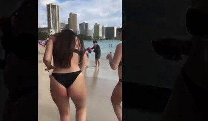 Big ass hunter filming on the beach