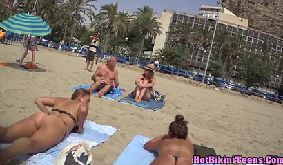 Big ass hunter filming on the beach