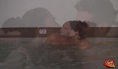 Big titted MILF visits swinger club with her husband