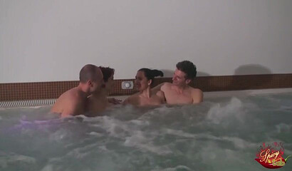 Big titted MILF visits swinger club with her husband