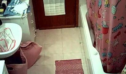 Watch sexy wife stripping and showering