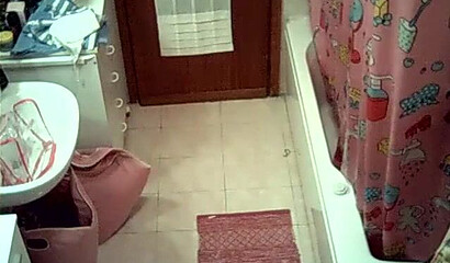 Watch sexy wife stripping and showering