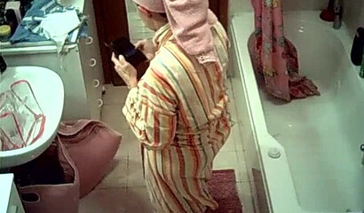 Watch sexy wife stripping and showering