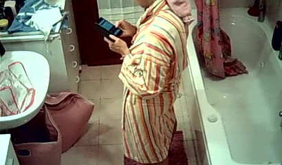 Watch sexy wife stripping and showering