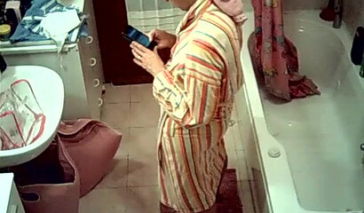 Watch sexy wife stripping and showering