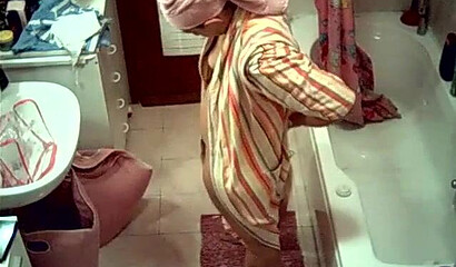 Watch sexy wife stripping and showering