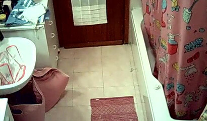 Watch sexy wife stripping and showering