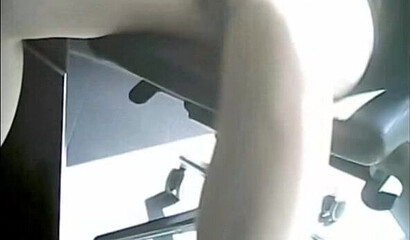Amateur secretary flashing in the office