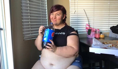 Nasty BBW with big tits drinks and eats