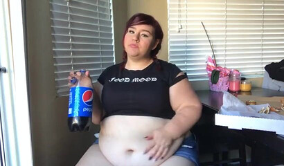 Nasty BBW with big tits drinks and eats