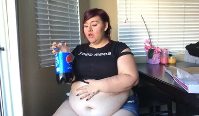 Nasty BBW with big tits drinks and eats