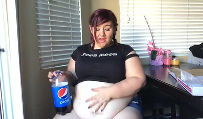 Nasty BBW with big tits drinks and eats