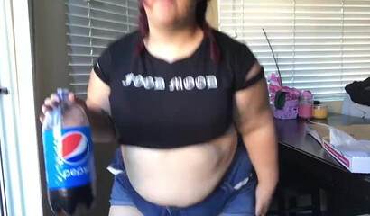 Nasty BBW with big tits drinks and eats